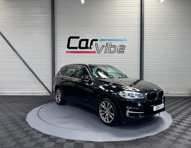 BMW X5 Exclusive A — photo 1