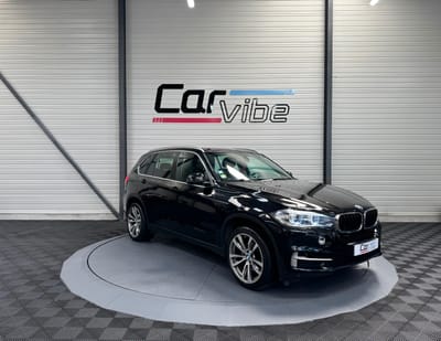 BMW X5 Exclusive A — photo 1